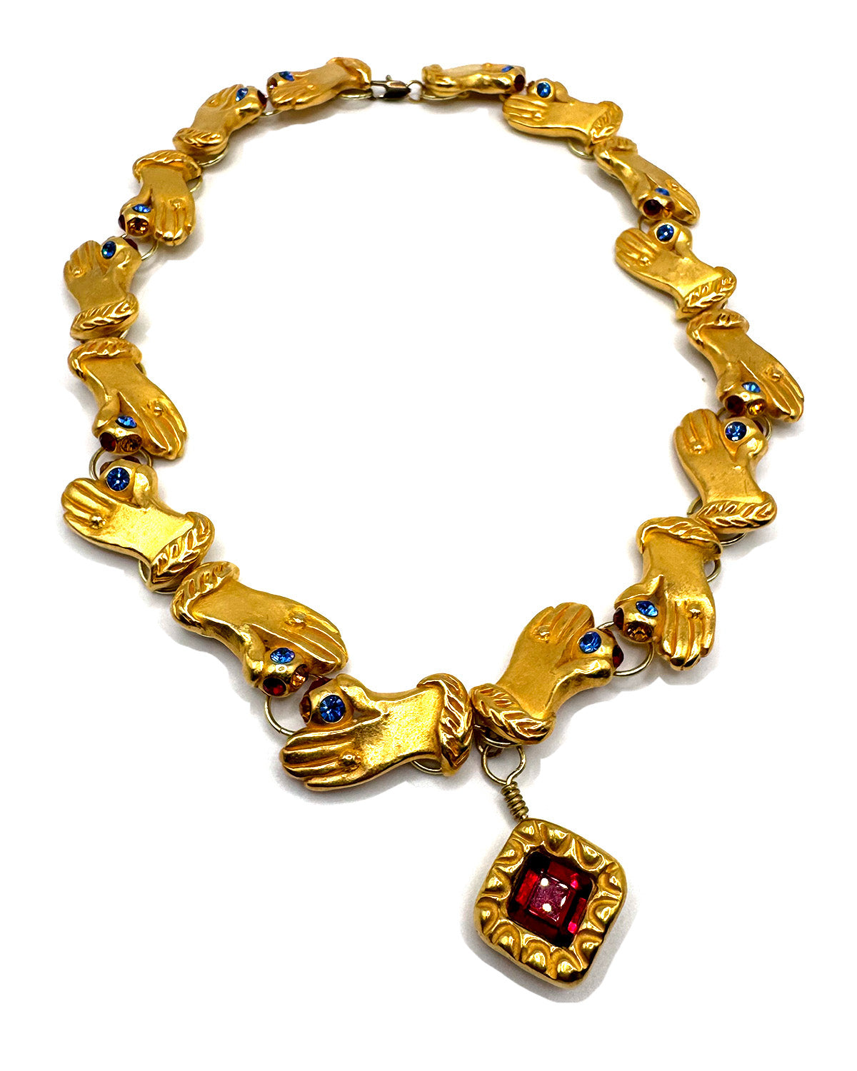 Hands with Red Jewel Necklace